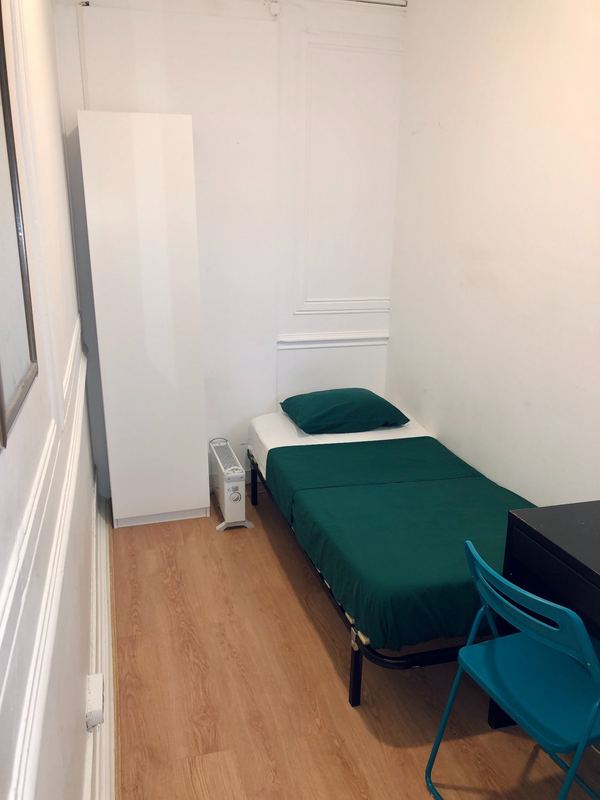 Bright Natural Light-filled Single Room 1 with Balcony View of the City — photo 27