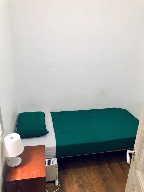 Bright Natural Light-filled Single Room 1 with Balcony View of the City — photo 35